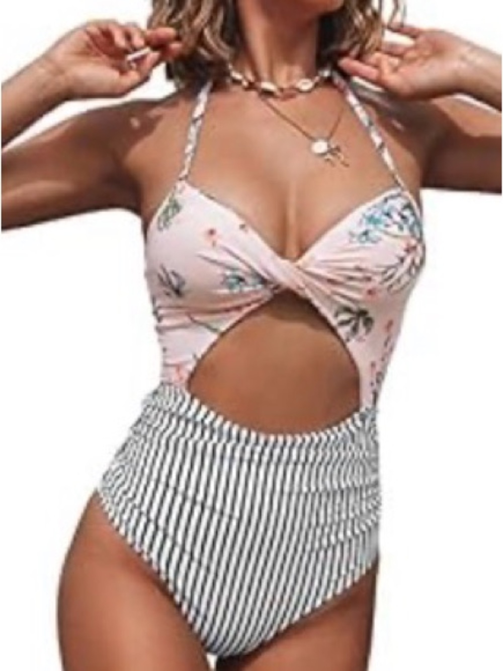 CUPSHE one piece cutout. Floral top, Black striped bottom. Size Small.